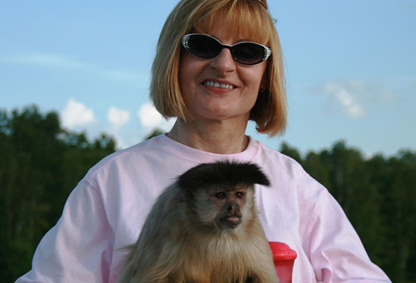 Current recipients stories - photo of monkey on woman's lap